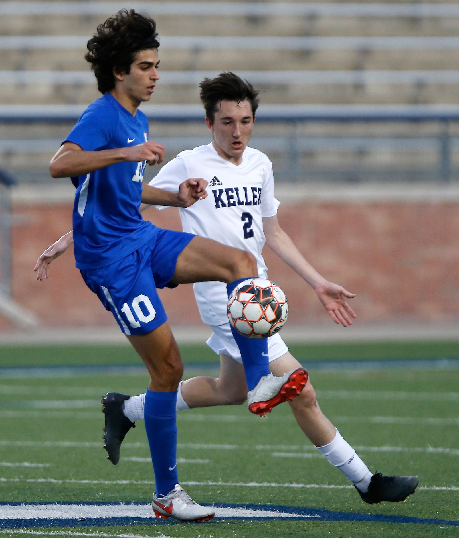 Allen midfielder Sam Presser (10) stops a pass in front of Keller Midfielder Tyler McCollum...