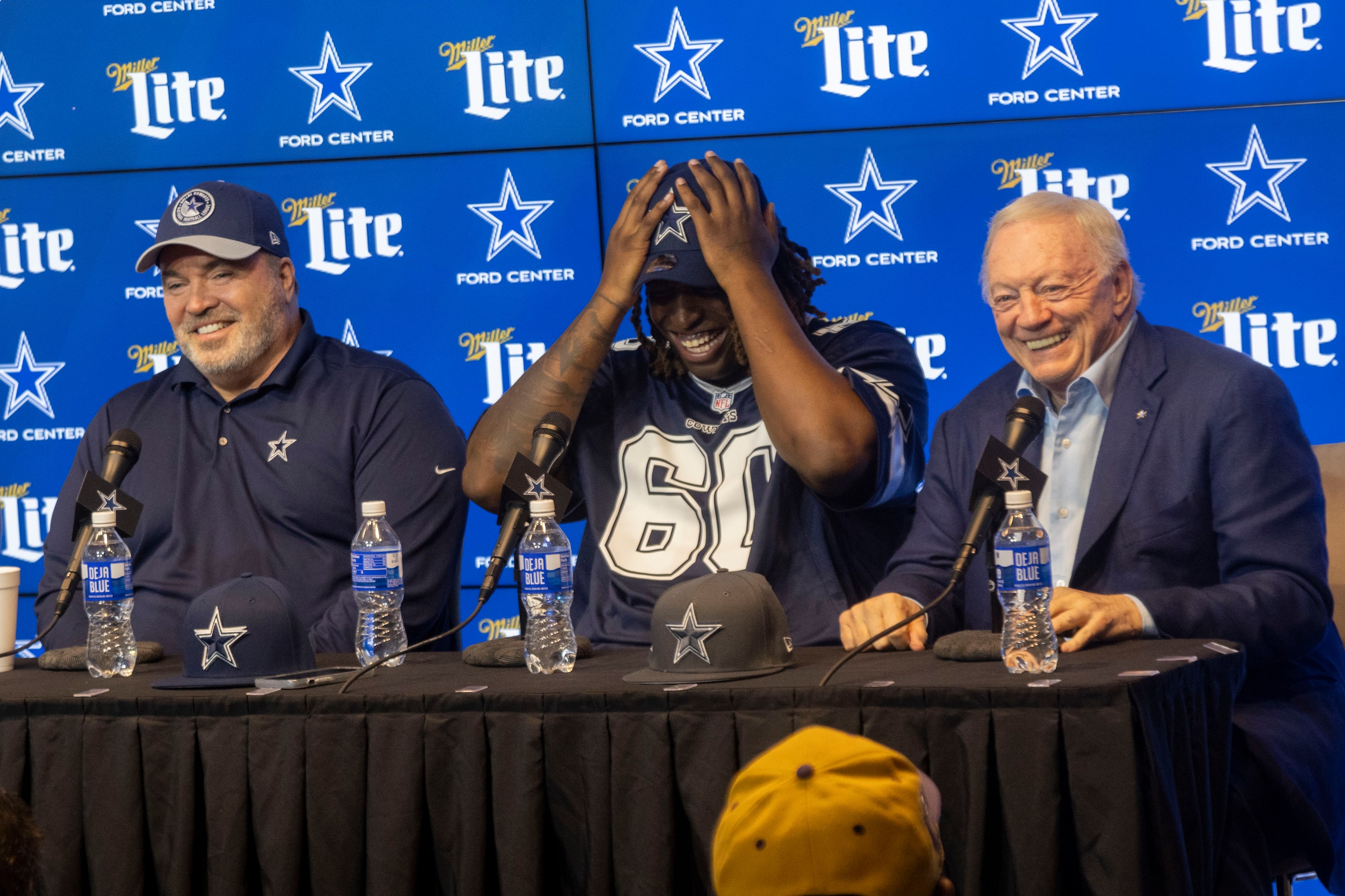 From left, Dallas Cowboys head coach Mike McCarthy, new left tackle Tyler Guyton, who was...