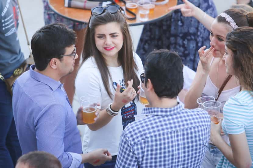 Groups of friends attended the Texas Ale Project's grand opening on April 25, 2015, which...