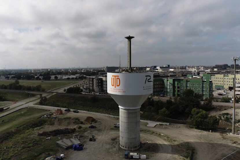 Construction crews recently lifted a massive steel water tower bowl to the top of a 100-foot...