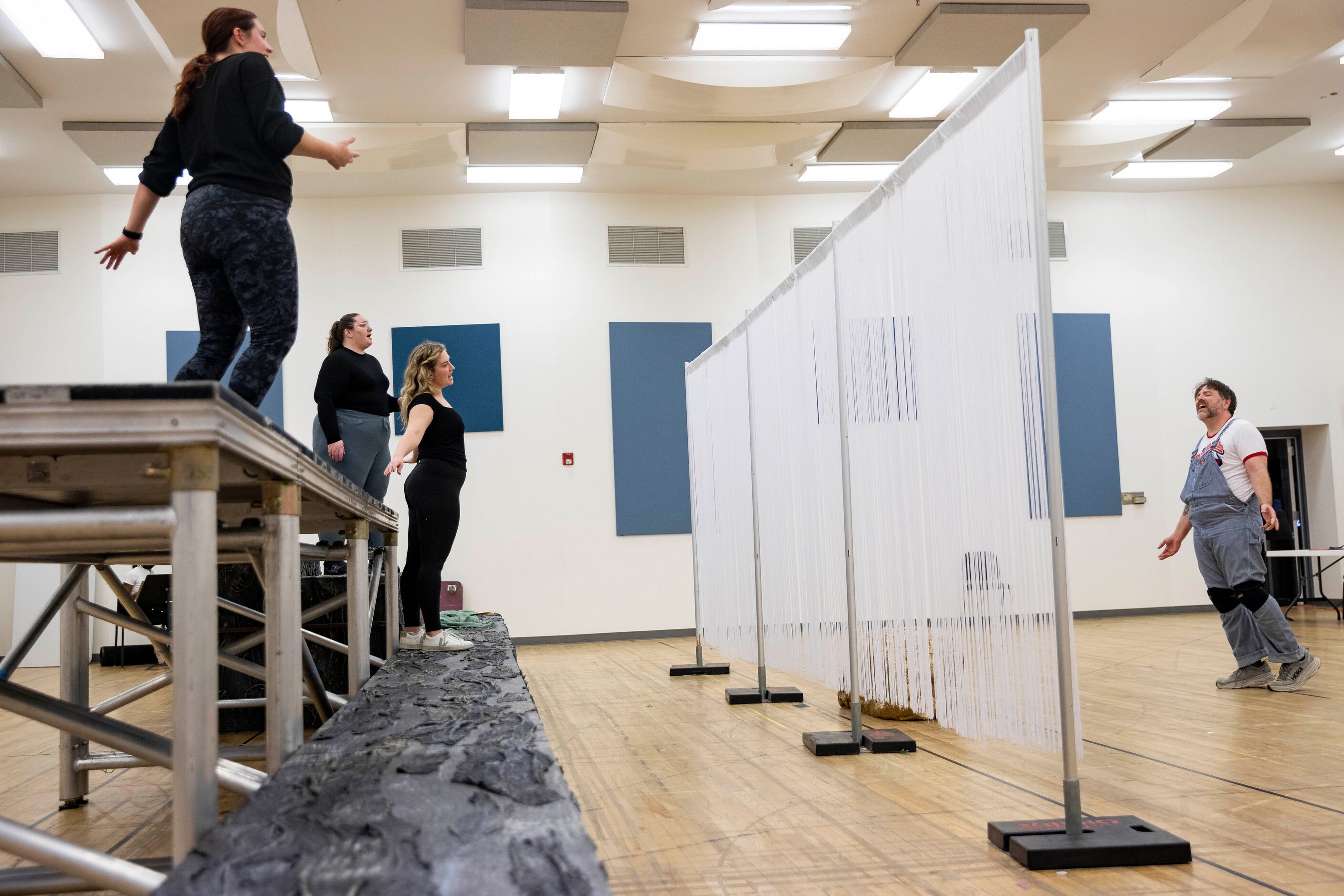 Singers perform during the staging rehearsal for Dallas Opera’s Das Rheingold on Wednesday,...