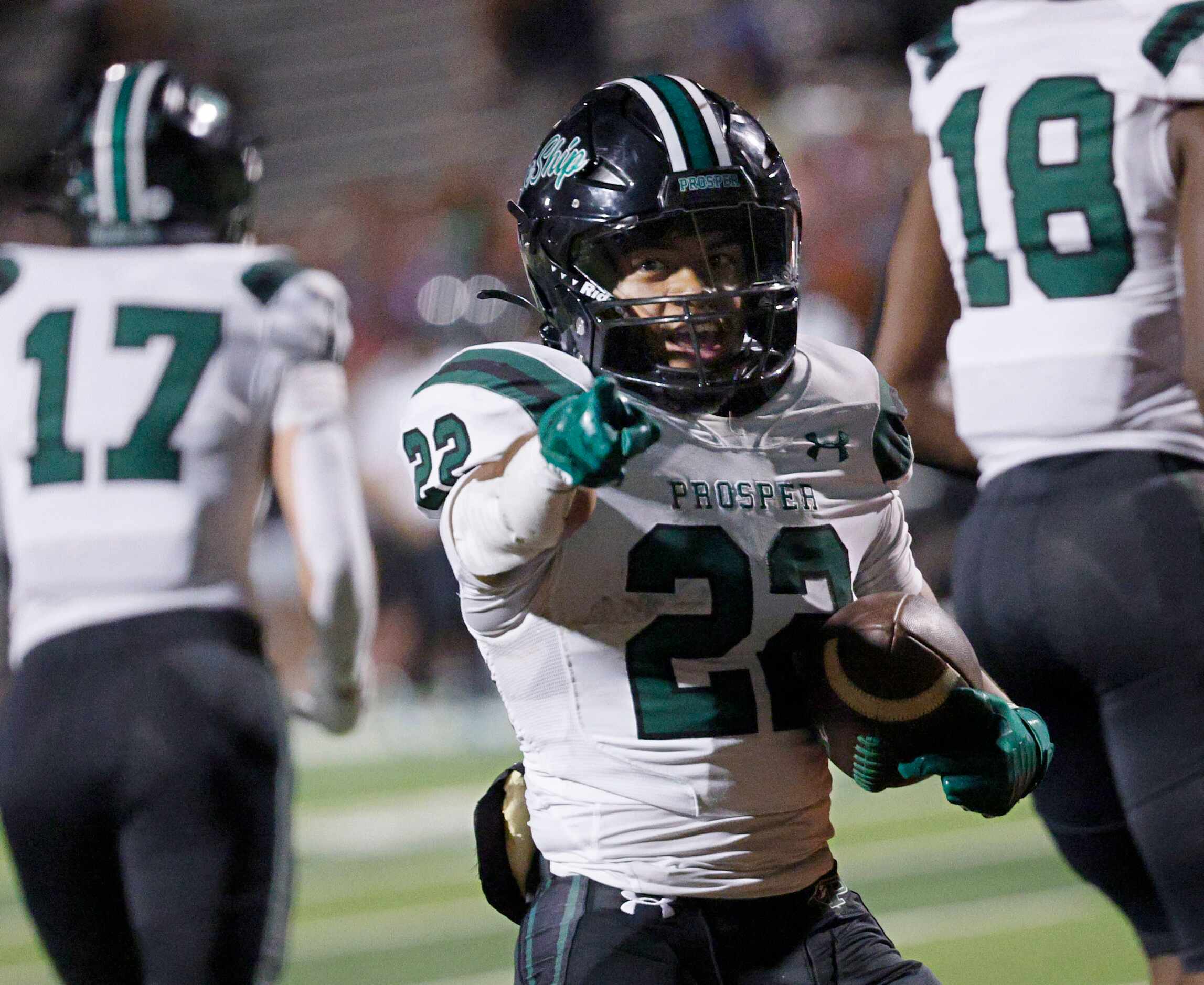 Prosper's Leo Anguiano (22) reacts after scored a touchdown over Rockwall during the first...