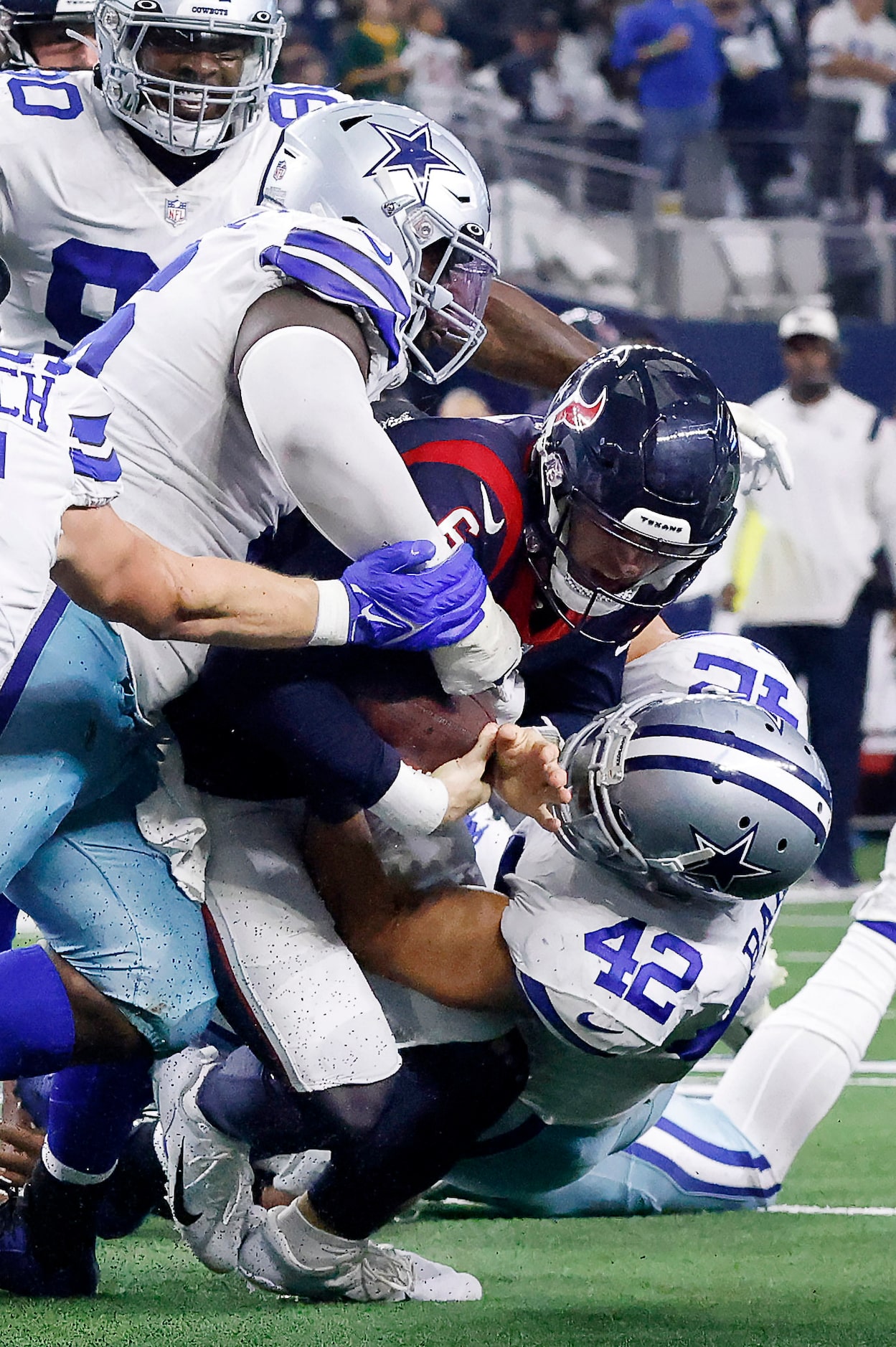 Dallas Cowboys linebacker Anthony Barr (42) and defensive tackle Neville Gallimore (96)...