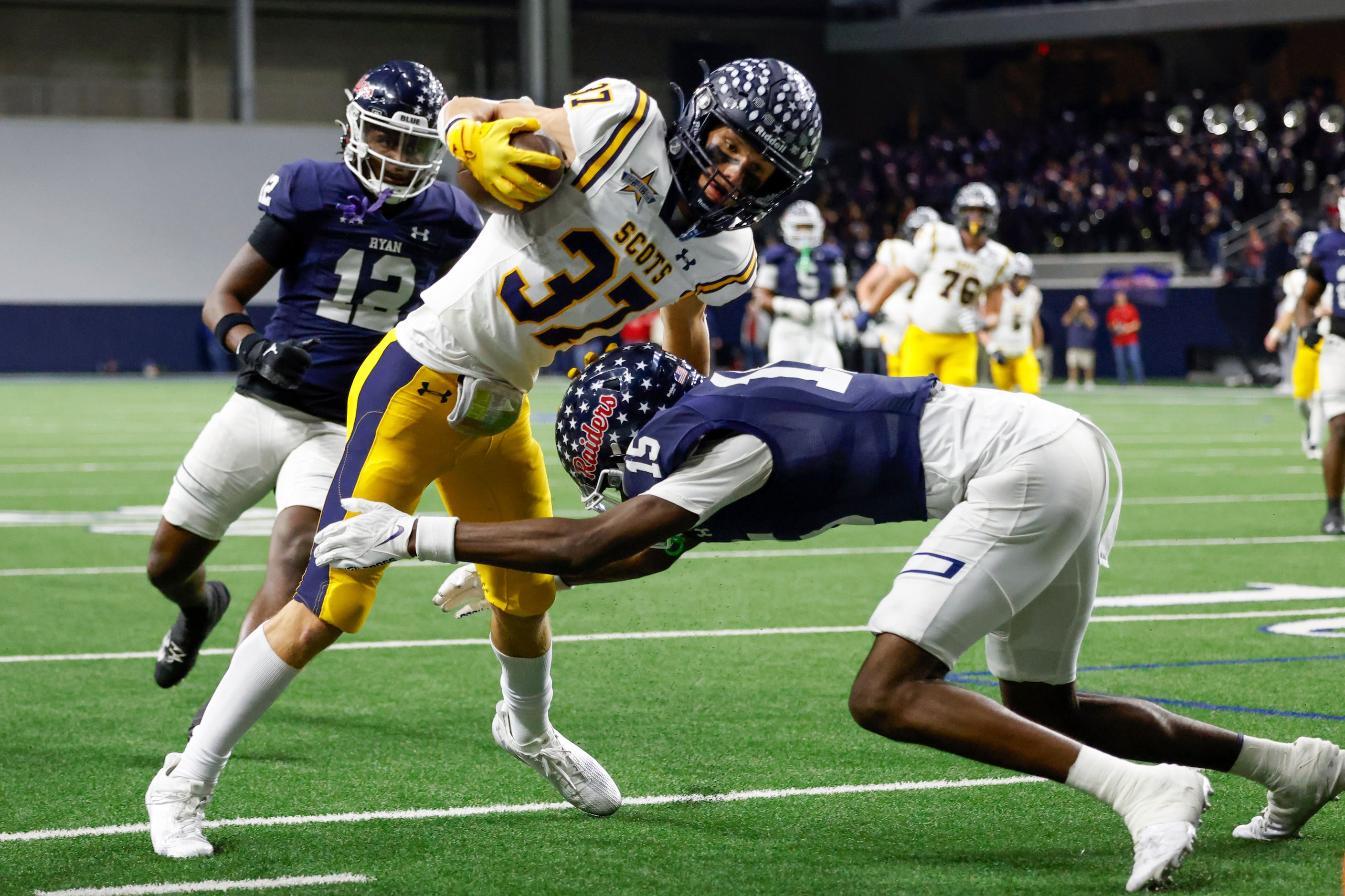 Denton Ryan defensive back Xaier Hiler (15) tackles Highland Park wide receiver Cannon...