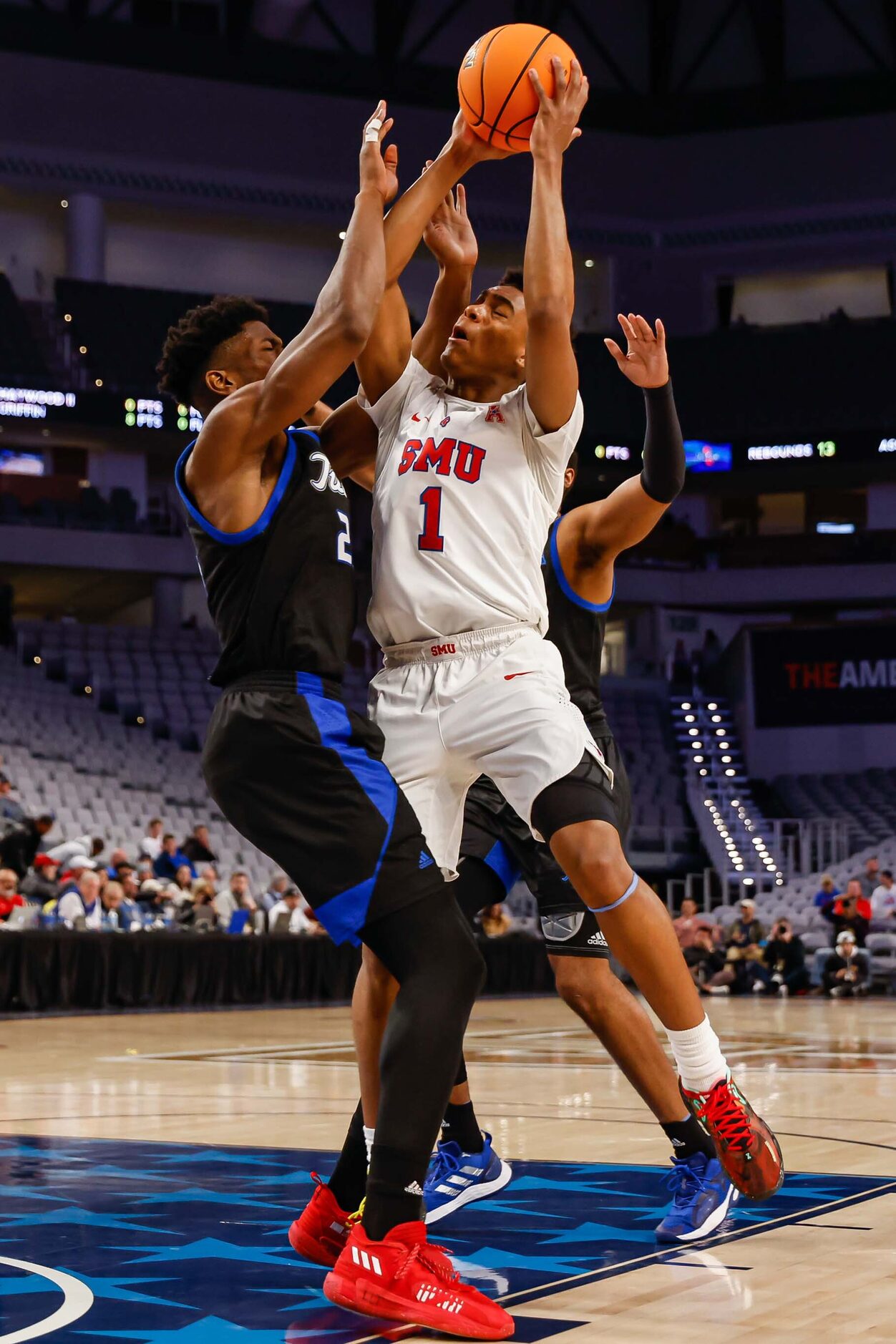 Southern Methodist Mustangs guard Zhuric Phelps (1) goes for a shot as Tulsa Golden...