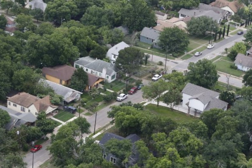 Homes across Dallas County, such as these near the Dallas Zoo in Oak Cliff, have seen...
