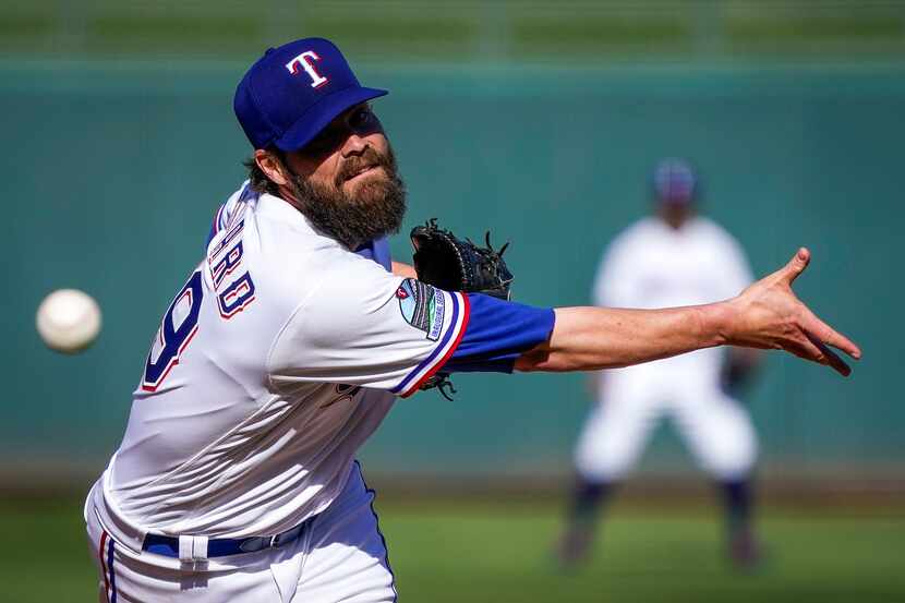 Texas Rangers pitcher Tim Dillard pitches during the seventh inning of a spring training...