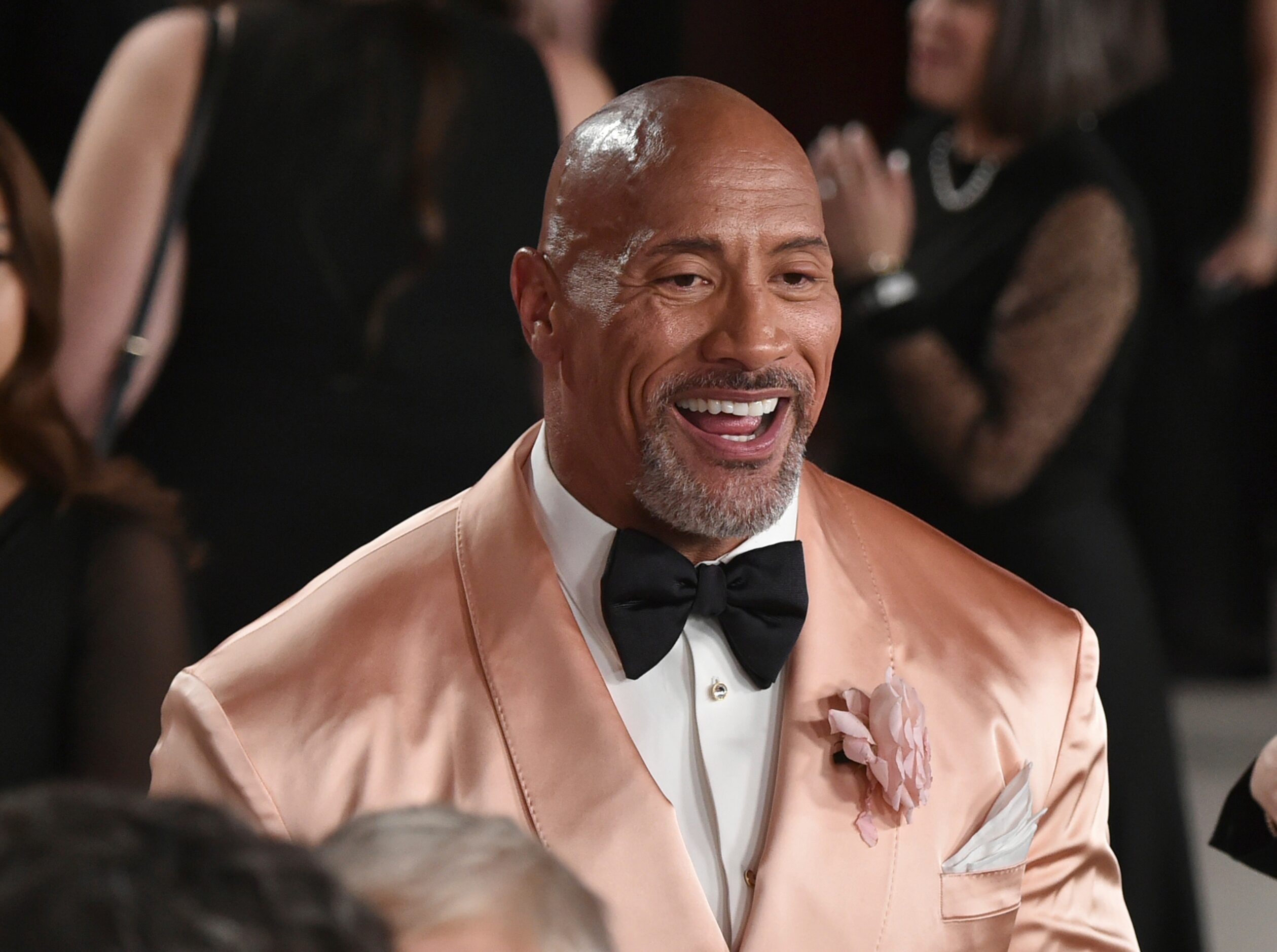 Dwayne Johnson arrives at the Oscars on Sunday, March 12, 2023, at the Dolby Theatre in Los...