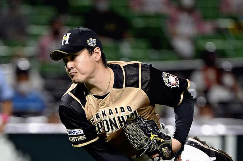 Nippon Ham Fighters starter Kohei Arihara fires a pitch during a game in Fukuoka on Aug. 29....