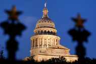 The Texas State Capitol is pictured at dusk in Austin, Texas, Thursday, December 9, 2021....