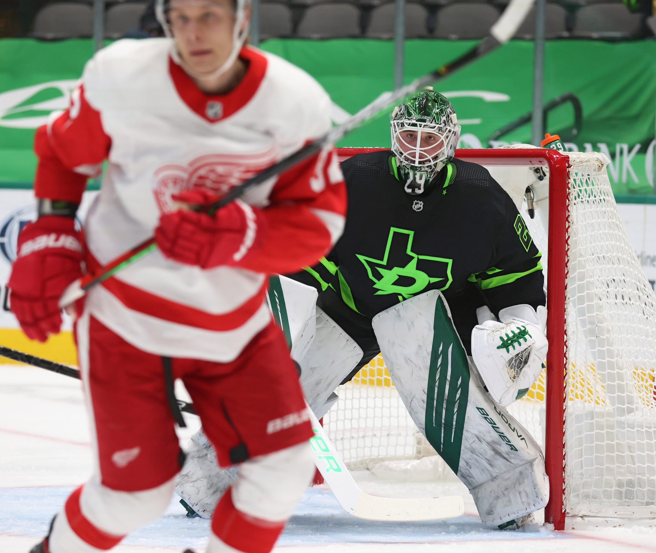 Dallas Stars goaltender Jake Oettinger (29) watches the play develop as he plays against the...