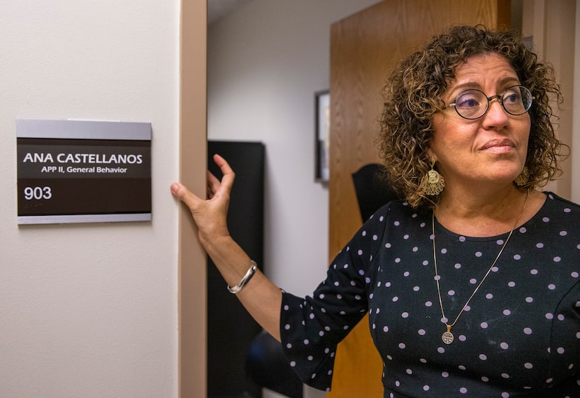 Ana Castellanos, a behavioral health provider, speaks to a visitor outside her office at the...