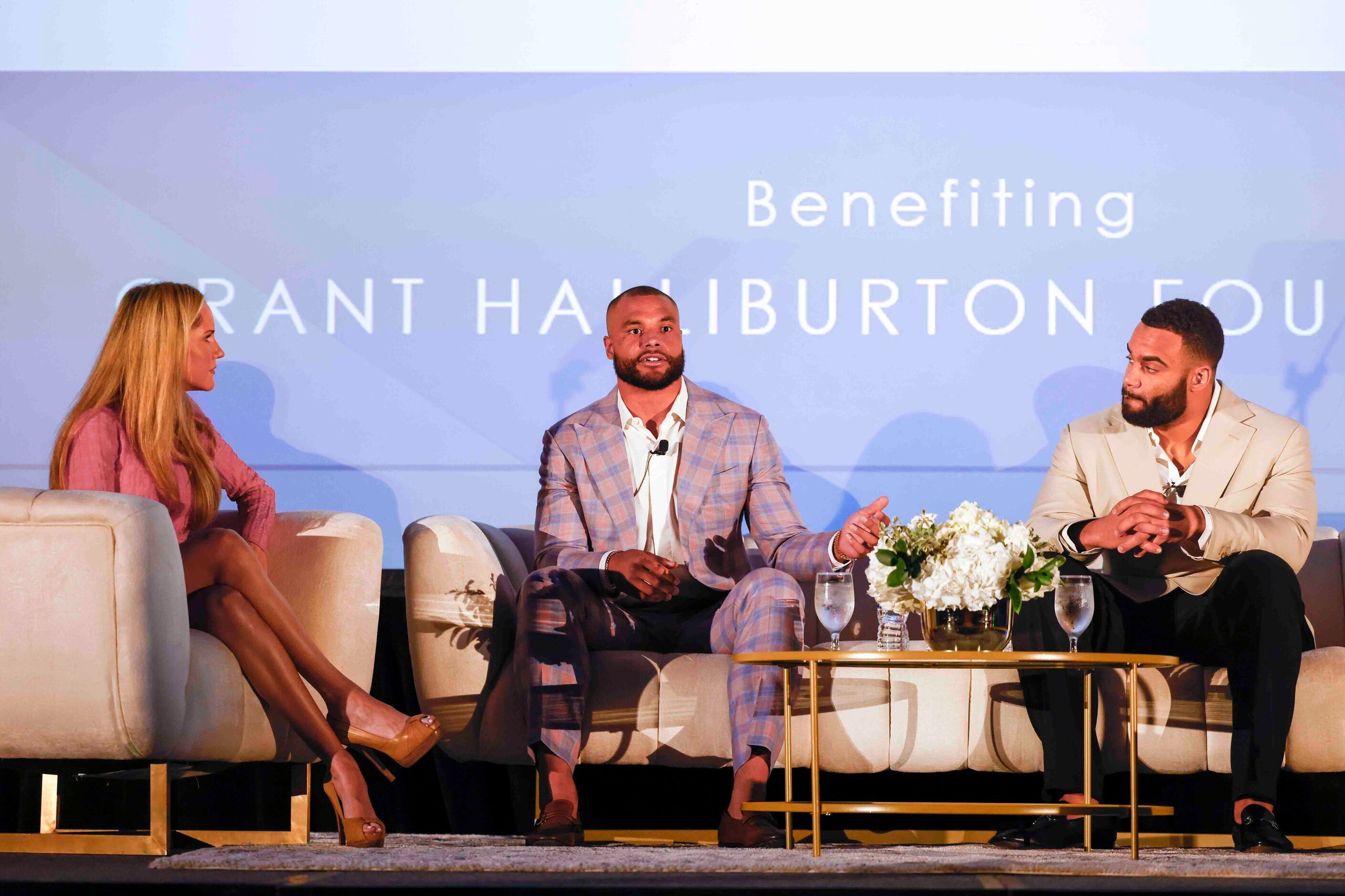 Moderator Andy Adler of CBS 11 (left), Cowboys QB Dak Prescott (center) and Solomon Thomas...