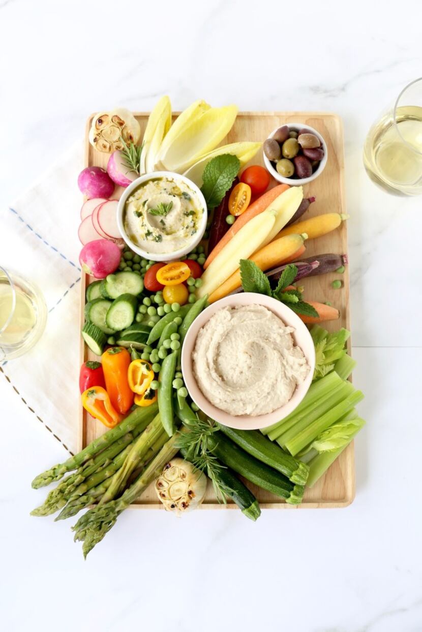 Spring Vegetable Crudités are served with White Bean Dip.
