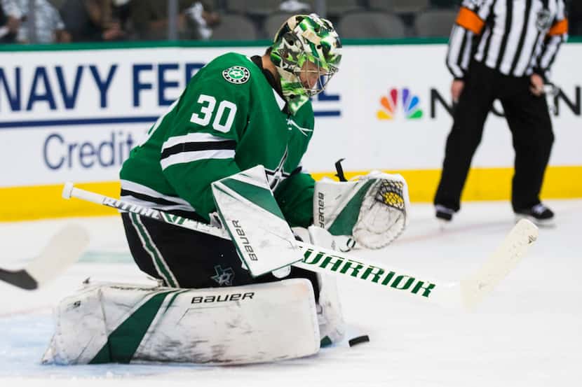 Dallas Stars goaltender Ben Bishop (30) stops a shot at the goal during the second period of...