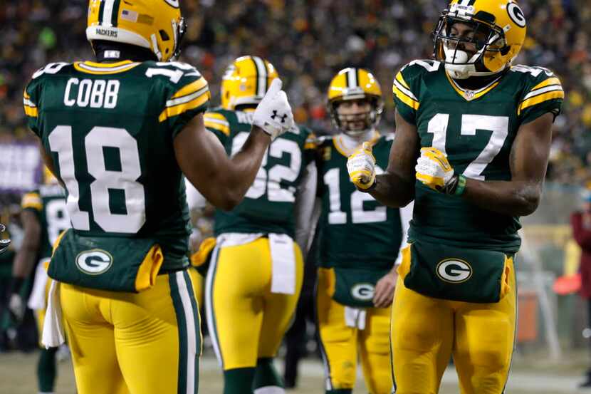 Green Bay Packers wide receiver Davante Adams (17) celebrates with wide receiver Randall...