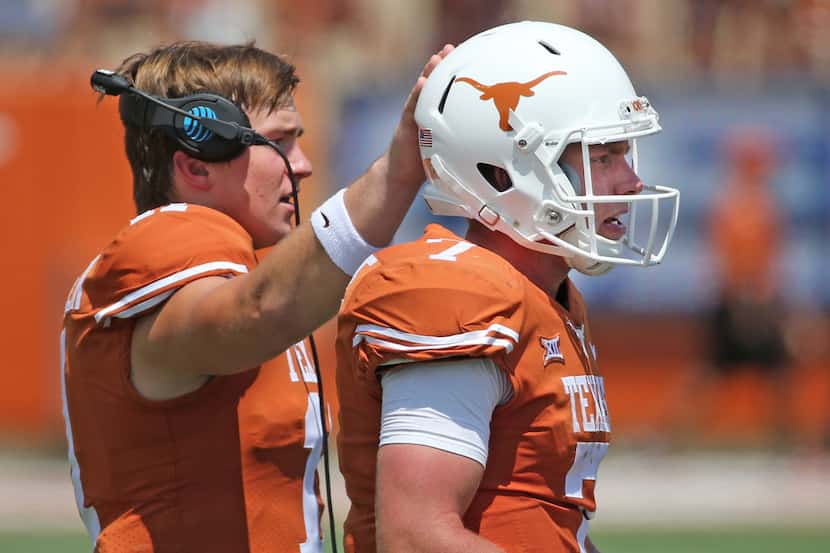 Texas Longhorns quarterbacks Sam Ehlinger (1) and Shane Buechele (7) are pictured during the...