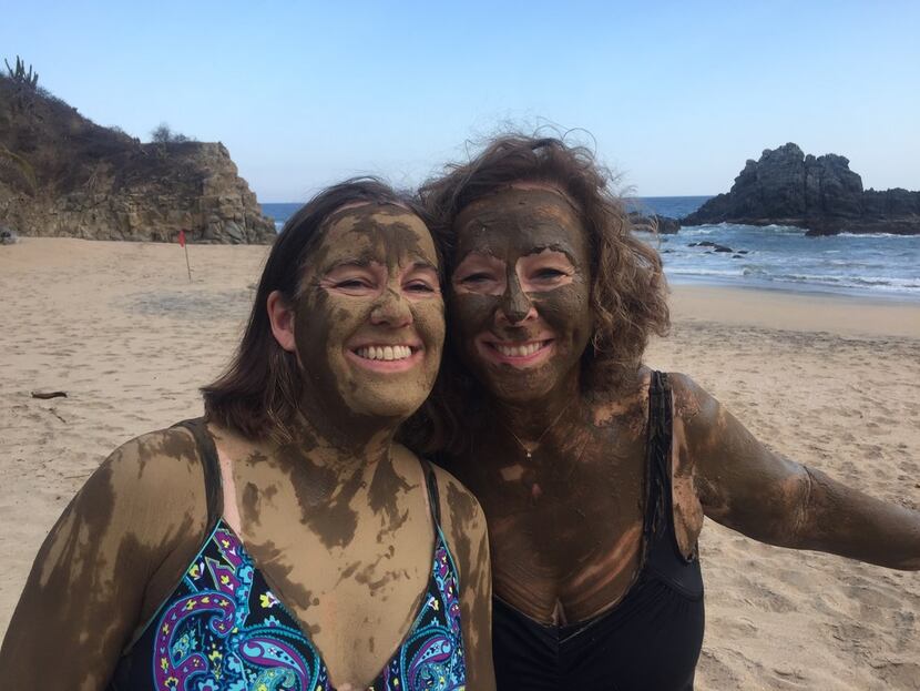 Writer Diana Lambdin Meyer (right) and her friend Amy Eckert enjoy a mud bath using...