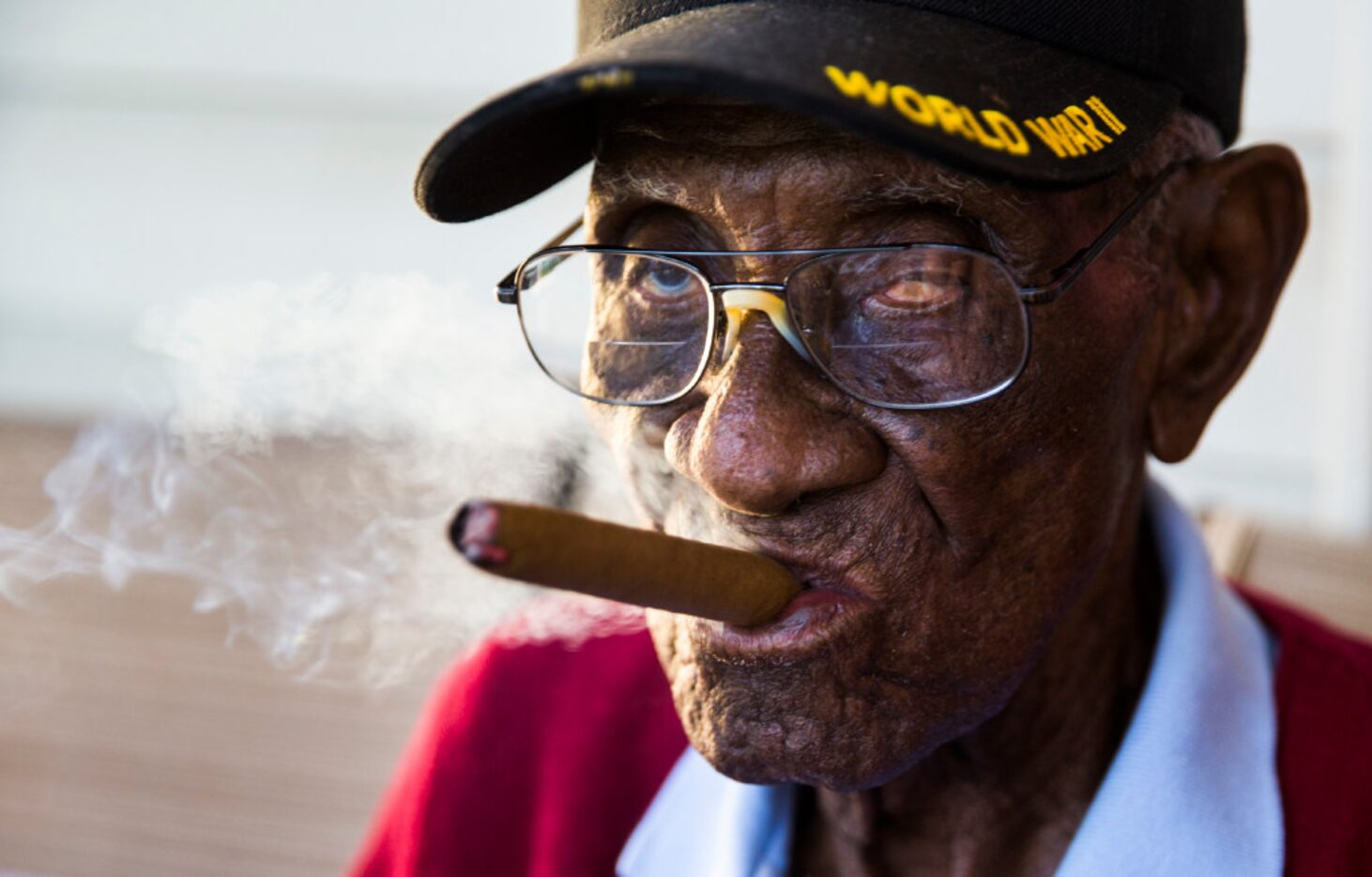 Richard Overton, 111, smokes a cigar on his front porch on May 25 in Austin, Texas. Overton...