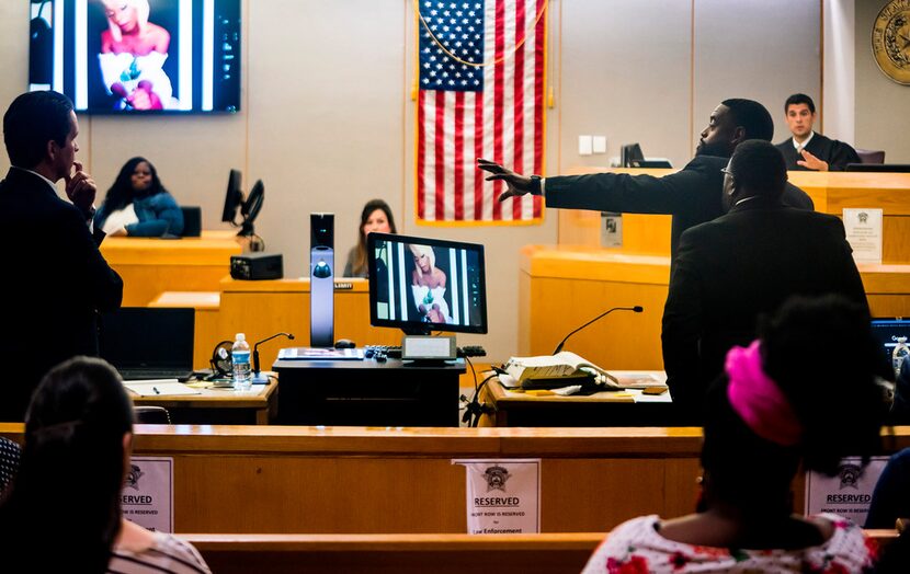 Defense attorney Andrew W. Wilkerson (right) objects as Muhlaysia Booker's mother, Stephanie...