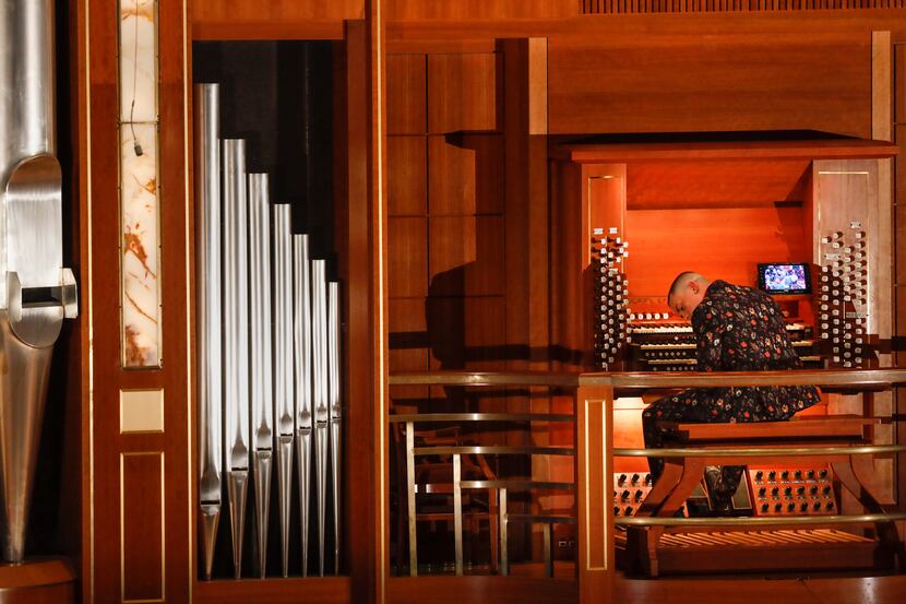 Organist Cameron Carpenter performs with the Dallas Symphony Orchestra during a concert on...
