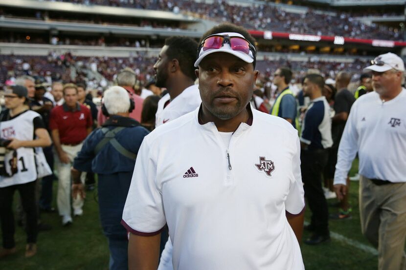 Texas A&M Aggies head coach Kevin Sumlin walks off the field field an NCAA football game...