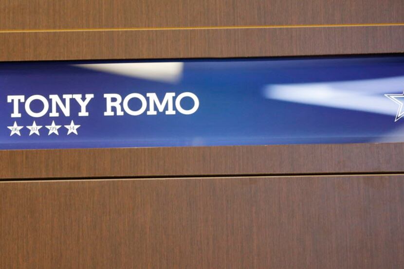 Detail of Tony Romo's nameplate at his locker inside the locker room at the Dallas Cowboys...