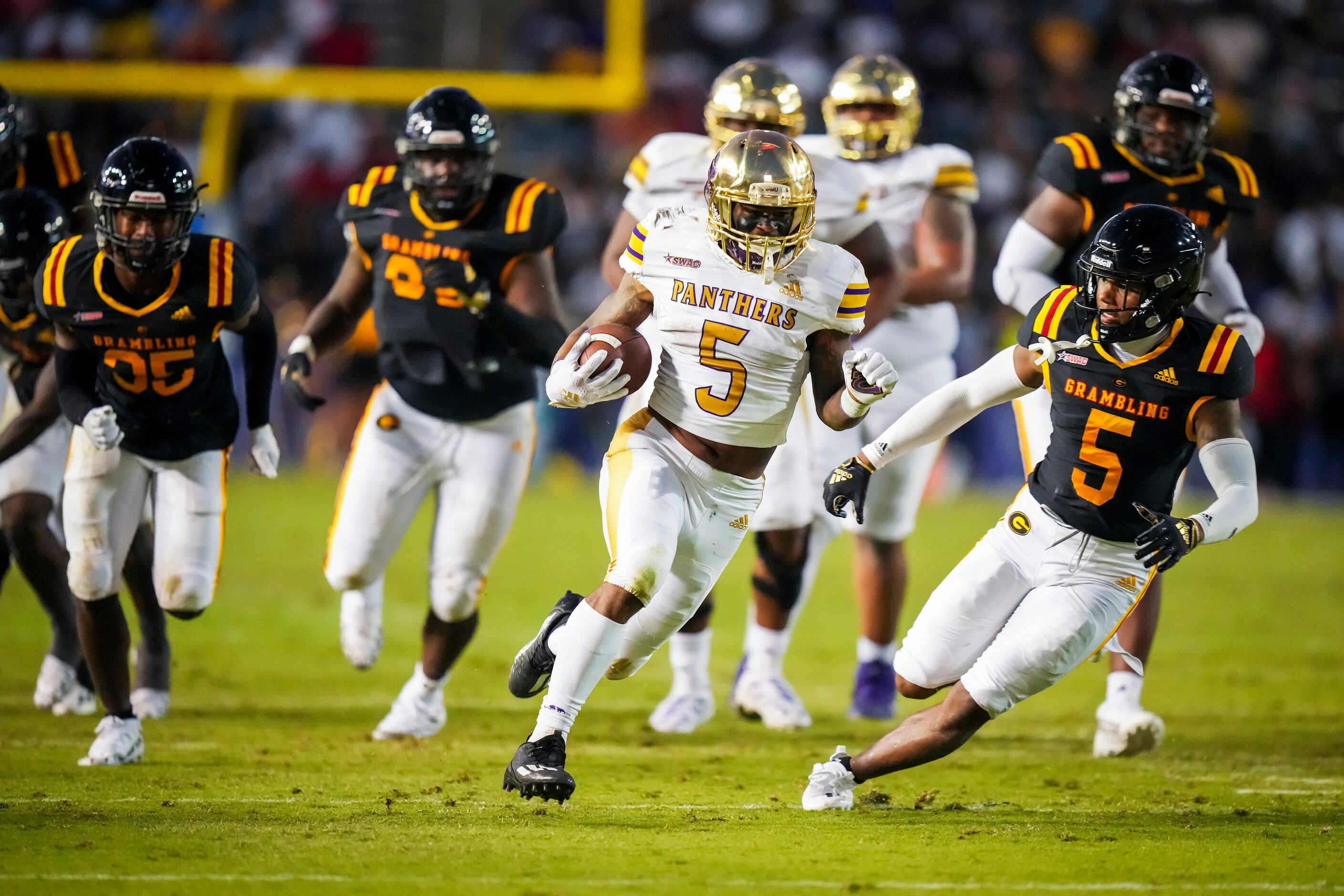 Prairie View running back Ahmad Antoine (5) breaks through the Grambling defense on a...