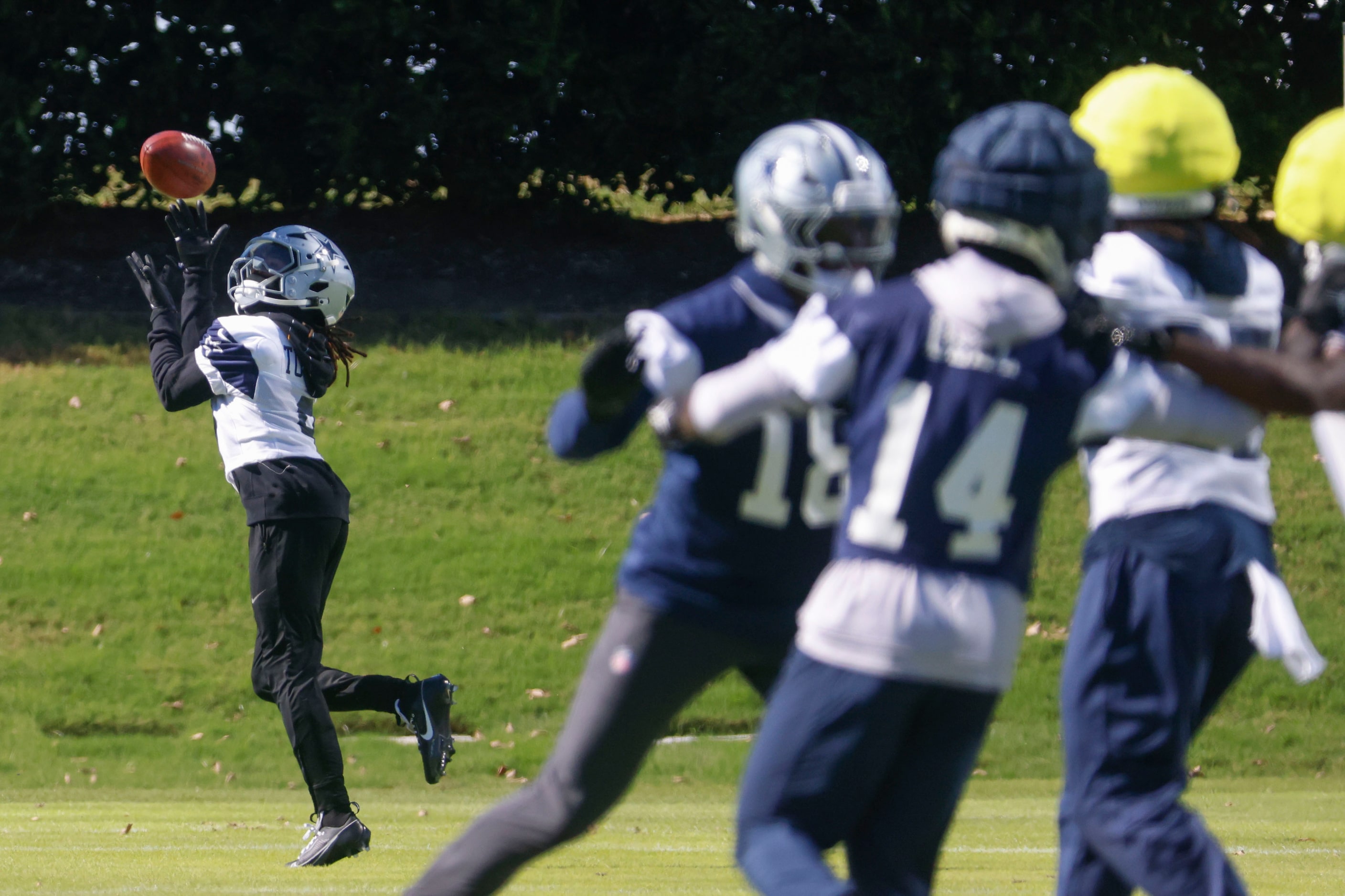 Twide receiver KaVontae Turpin (left) catches a pass  during a team practice on Wednesday,...