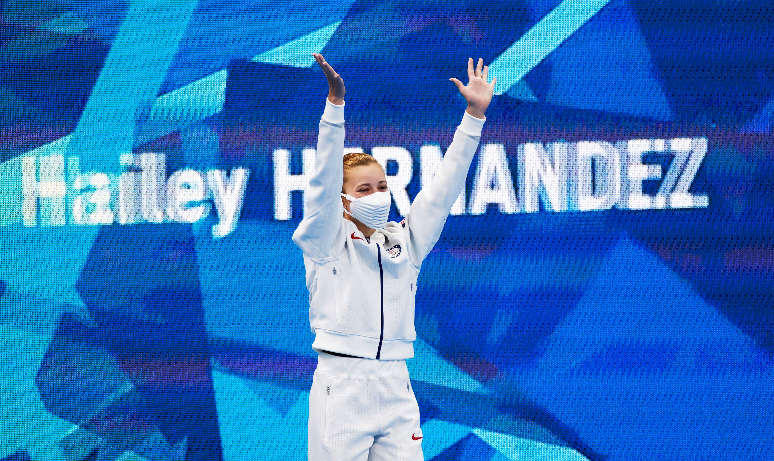 USA’s Hailey Hernandez waves as she is introduced before the start of the women’s 3 meter...