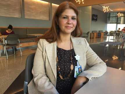 Former HOMES patient Latisha Blair, 39, now works at Parkland Memorial Hospital as a data...