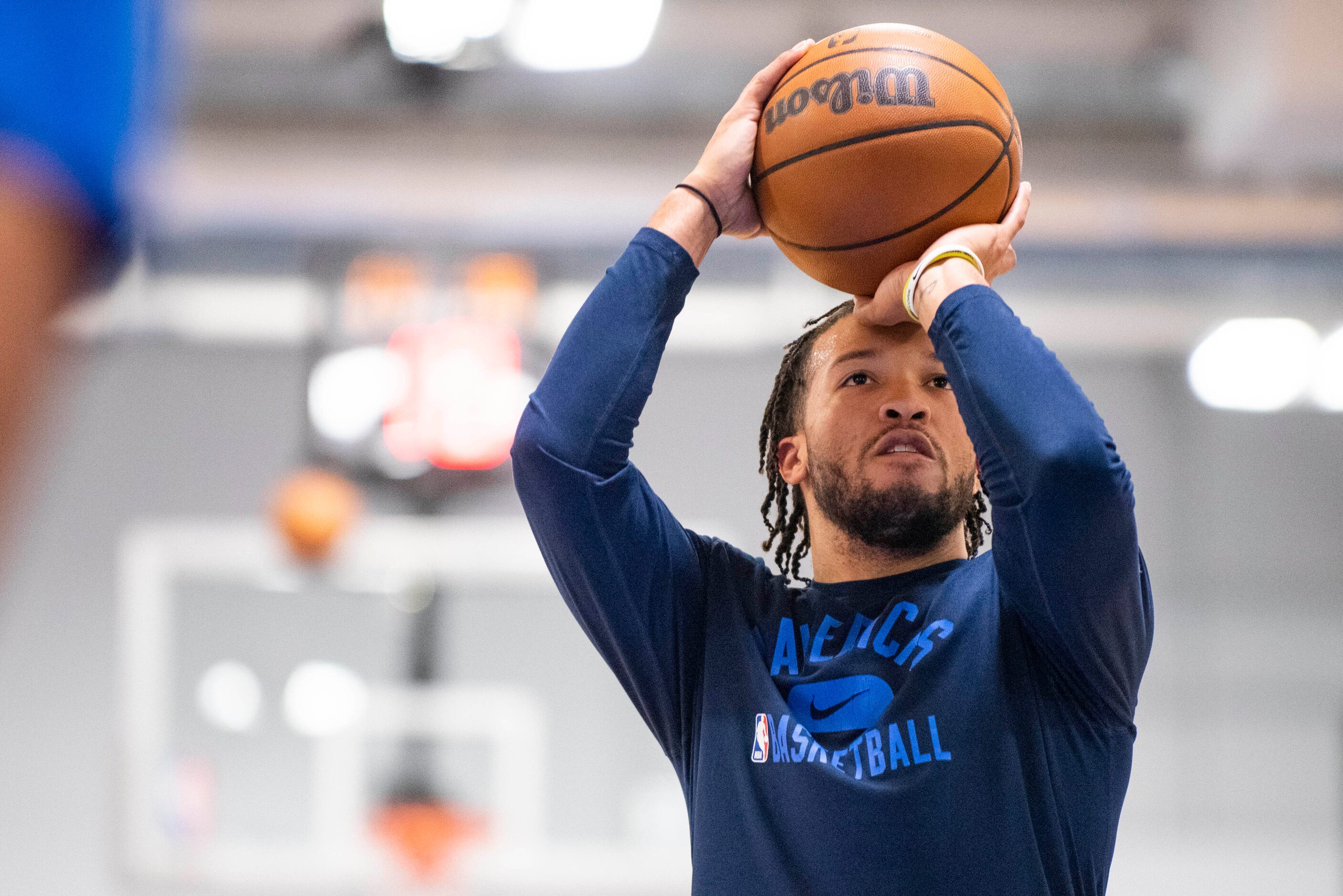 Dallas Mavericks point guard Jalen Brunson (13) shoots free throws while practicing at the...