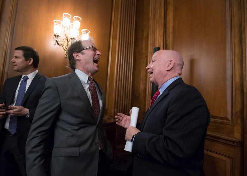House Ways and Means Committee Chairman Kevin Brady, R-Texas, right, steward of the GOP tax...