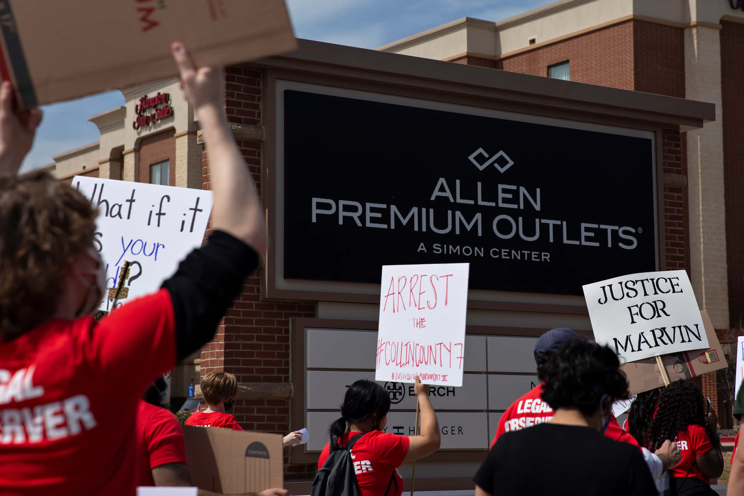 People march to the Allen Outlets on Sunday, March 21, 2021 demanding justice for Marvin...