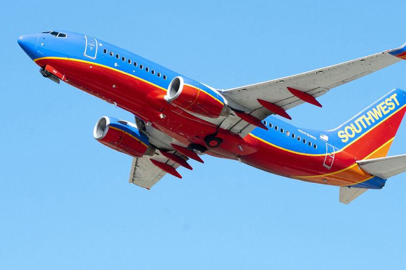 A Southwest Airlines jet takes off. An airline employee is being praised for tracking down a...