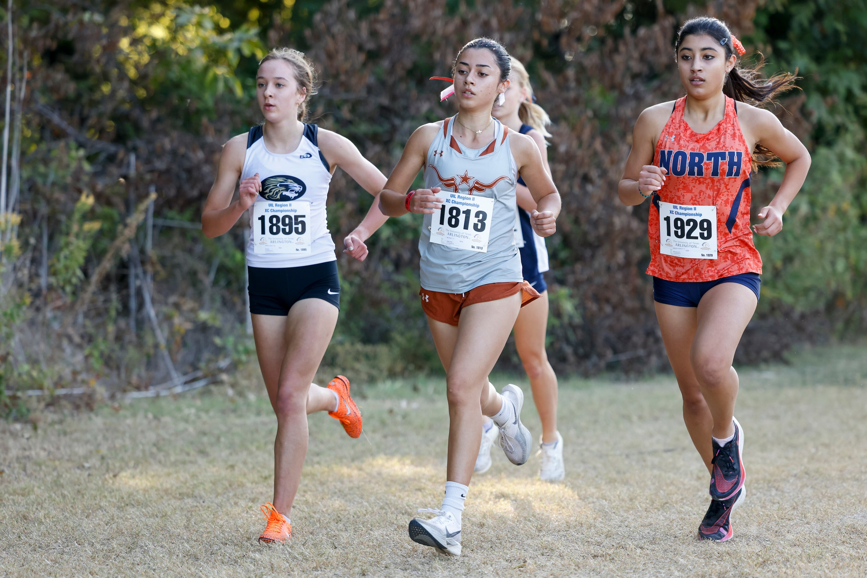 Kaufman’s Kathryn Tucker (from left), W.T. White’s Mia Oliver and McKinney North’s Galilea...