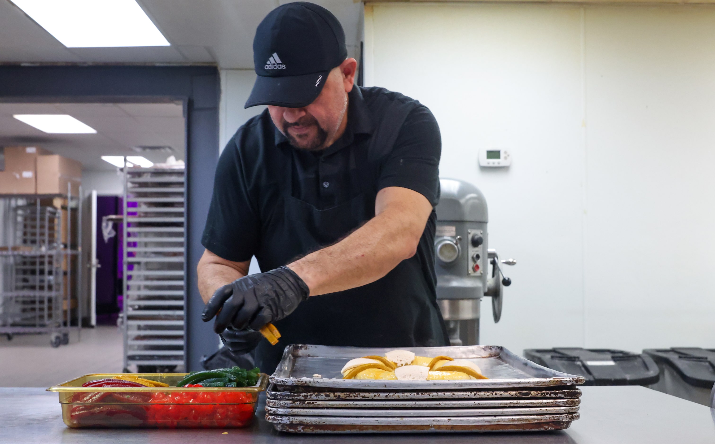 Baker Isaac Ramirez prepares Rosca de Reyes at Tango Bakery in Garland on Thursday, Jan. 5,...