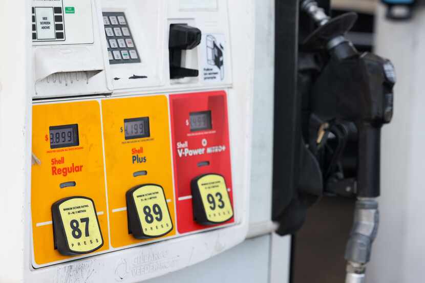Regular gas prices fall below $4.00 at a station on Fort Worth Avenue and N. Hampton Road on...