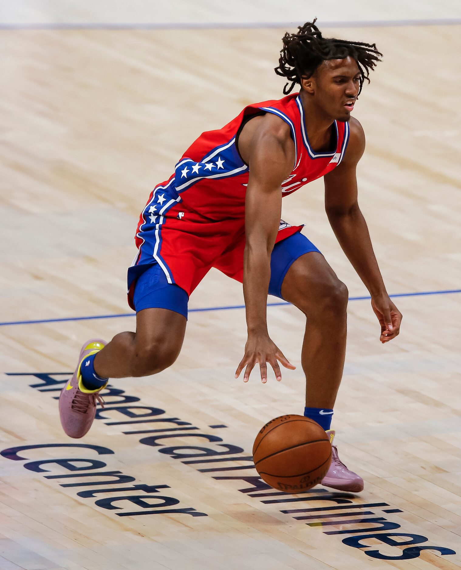 Philadelphia 76ers guard Tyrese Maxey (0) looks for room against the Dallas Mavericks...