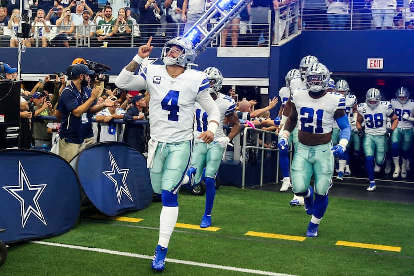 Dallas Cowboys quarterback Dak Prescott (4) takes the field before an NFL game between the...