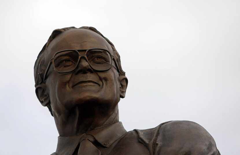 A nine-foot-tall, bronze statue of Lamar Hunt stands at the north gates of Pizza Hut Park...