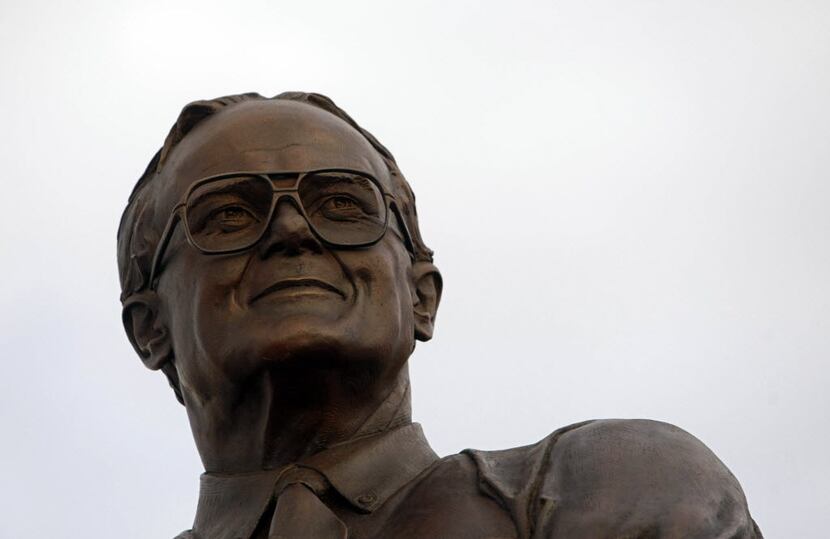 A nine-foot-tall, bronze statue of Lamar Hunt stands at the north gates of Pizza Hut Park...