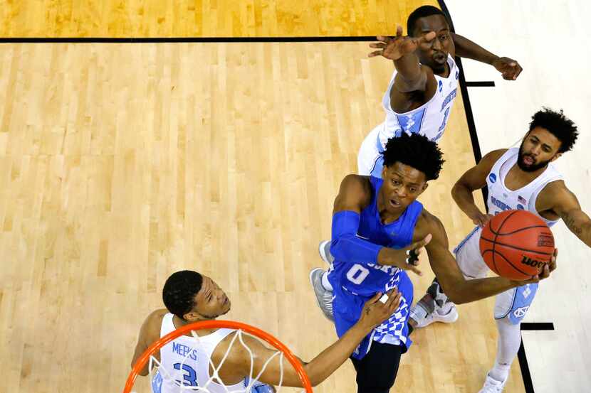 MEMPHIS, TN - MARCH 26: De'Aaron Fox #0 of the Kentucky Wildcats drives to the basket in the...