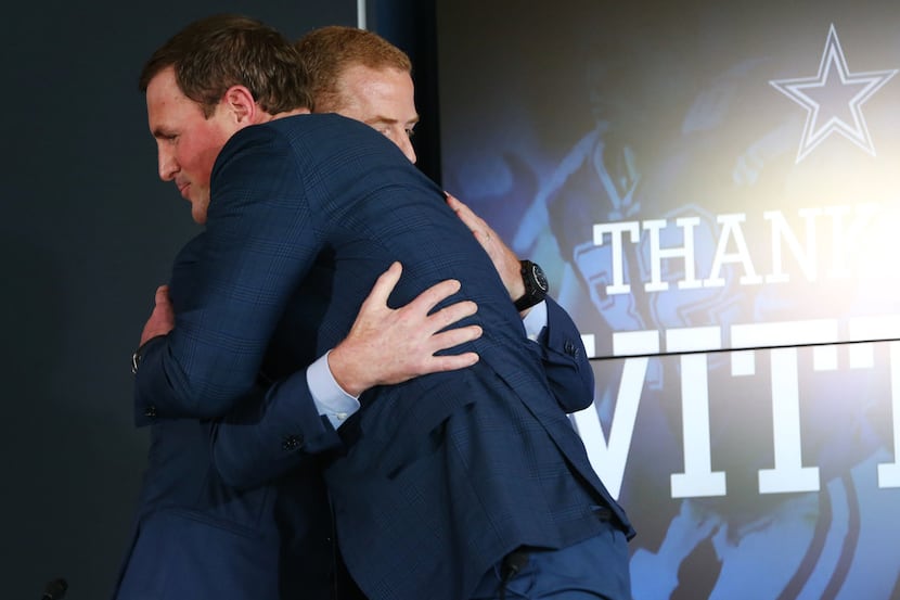 Dallas Cowboys head coach Jason Garrett hugs Dallas Cowboys tight end Jason Witten after...