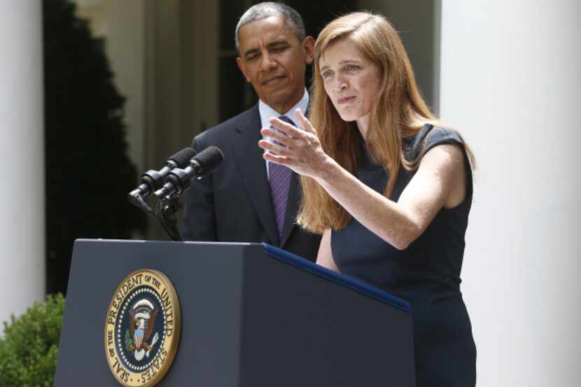 President Barack Obama stands with Samantha Power, his nominee to be the next United Nations...