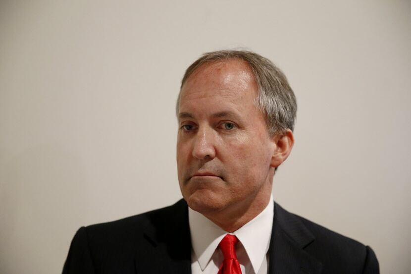  Ken Paxton speaks after he was sworn in as the Texas attorney general on Jan. 5, 2015, in...