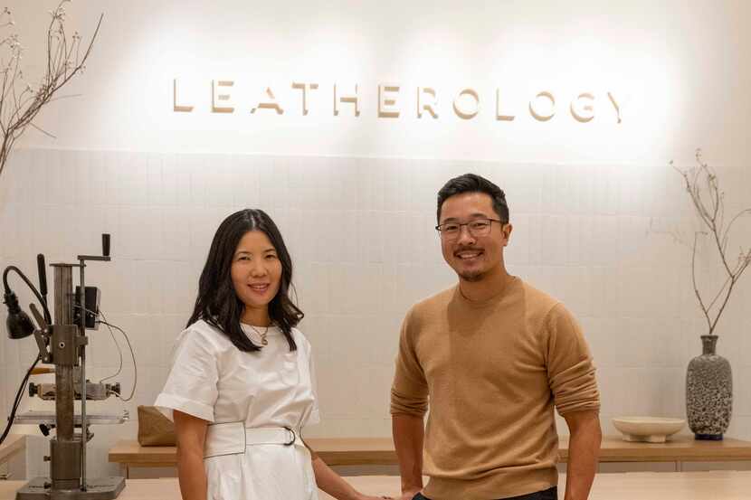 Rae Liu (left) stands with her brother David Liu at their Leatherology store at NorthPark...
