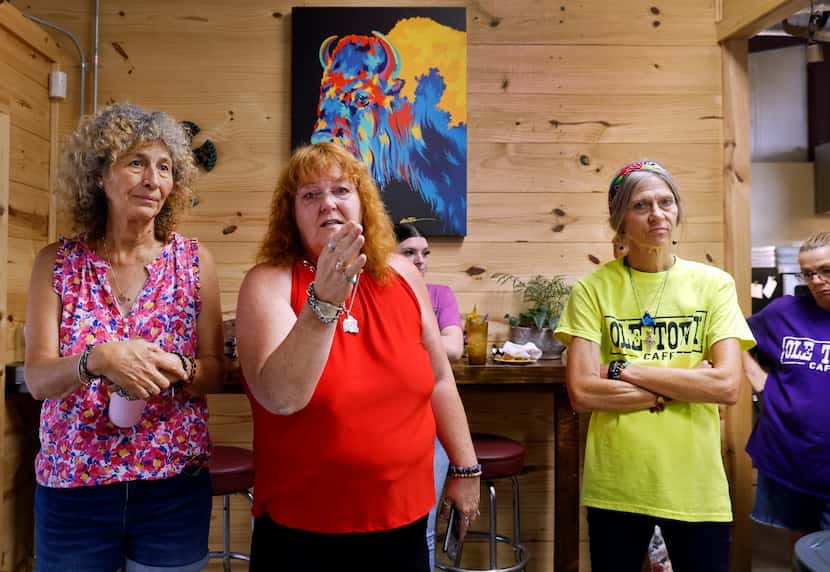 At the Ole Town Cafe, Linda Good McGillis (center) and her followers (from left) Mariana...