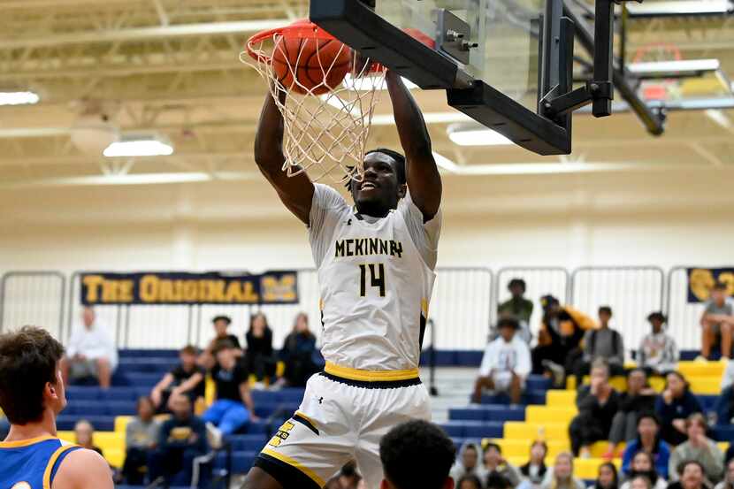 McKinney’s Alex Anamekwe dunks in the second half  during a boys high school basketball game...