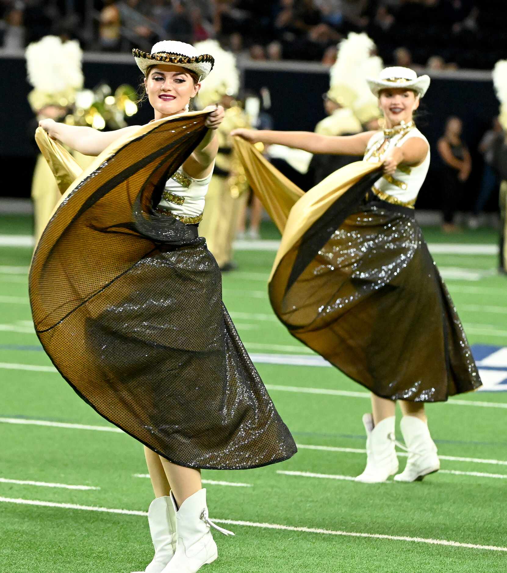 The Colony’s drill team performs in the first half of a high school football game between...